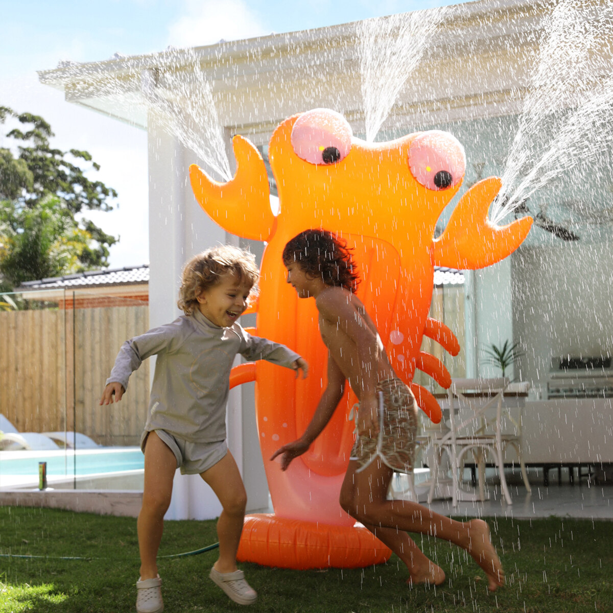 Inflatable Giant Sprinkler Sonny the Sea Creature Neon Orange